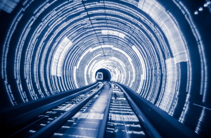 Light Tunnel Abstract background light waves in deep train tunnel.