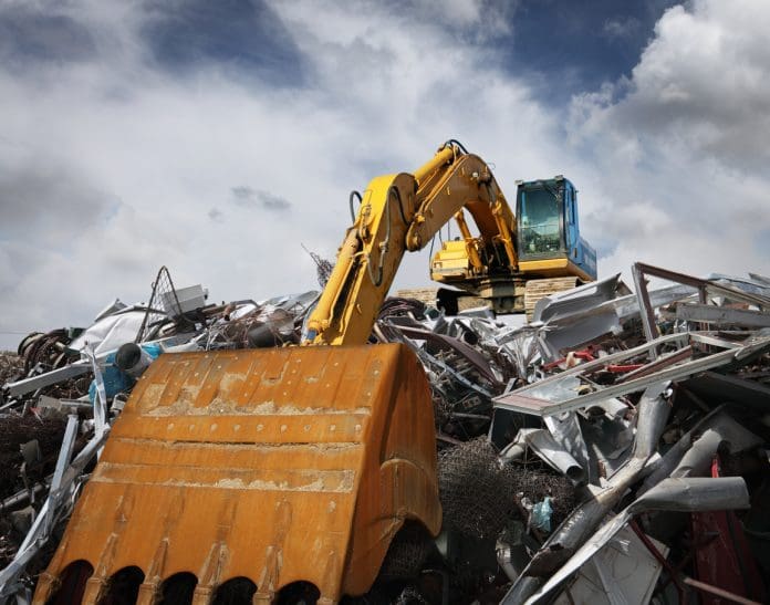 Excavator working at garbage dump Excavator working at garbage dump, photomontage. See my other similar photos: