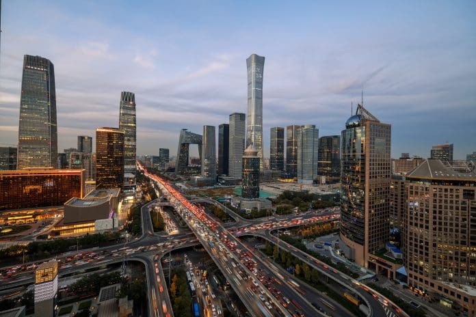 Beijing Central Business district buildings skyline night, beijing China cityscape Aerial shot of traffic in Beijing central business district at dusk. China is ramping up its smart city and urban digitalization efforts