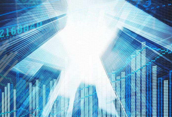 Double explosure with businesss charts and financial district of Nemetschek Group invests in US construction AI solution provider Document Crunch