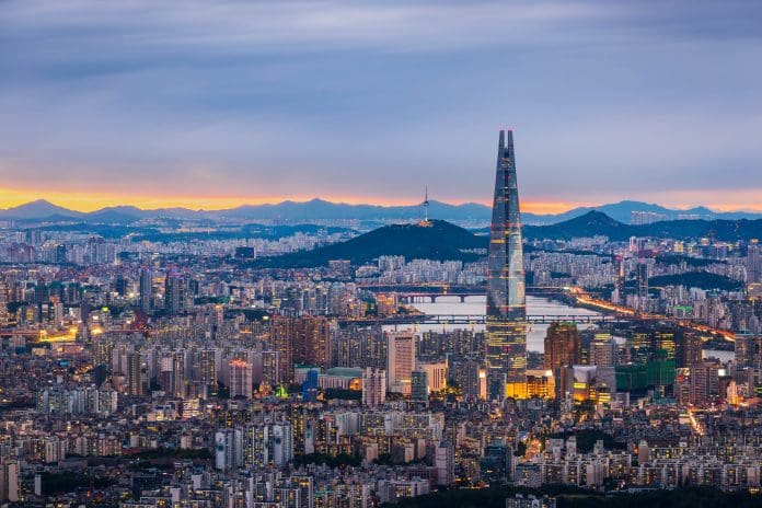 Seoul City skyline and downtown and skyscraper at night is The best view and beautiful of South Korea at Namhansanseong mountain. Daewoo launches Smart Construction Alliance