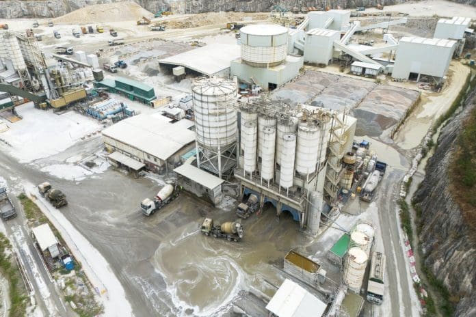 concrete plant and aggregate quarry aerial view of cement concrete plant next to stone aggregate quarry